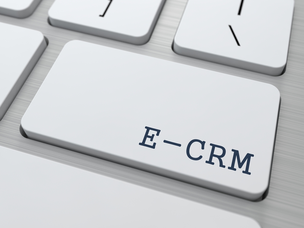 E-CRM. Information Technology Concept. Button on Modern Computer Keyboard. 3D Render.